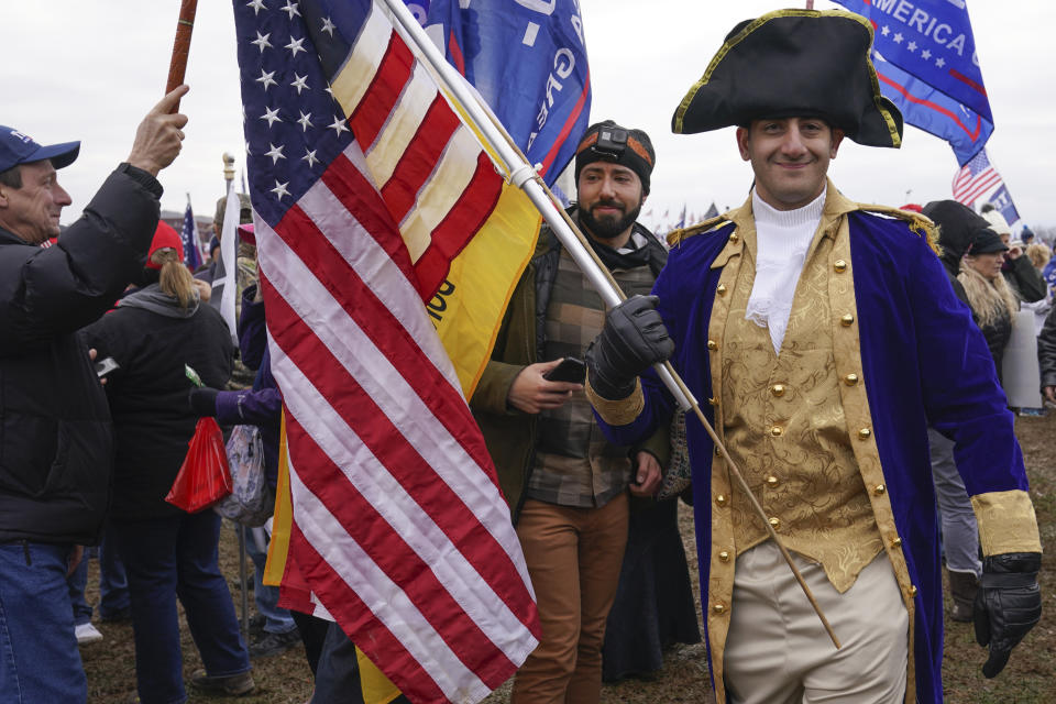 Supporters loyal to President Donald Trump attend a rally on the Ellipse near the White House on Jan. 6, 2021, in Washington. (AP Photo/John Minchillo)