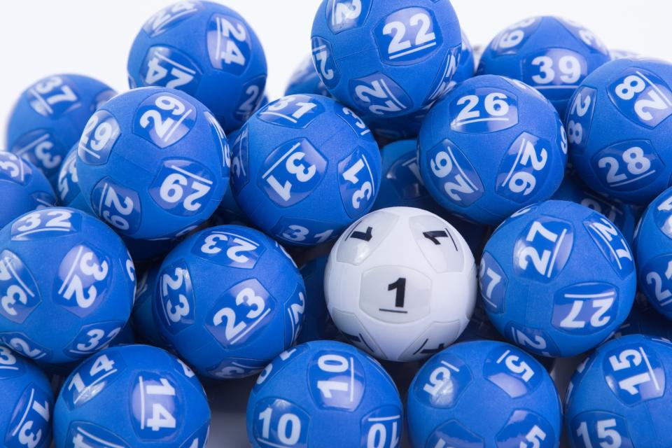 Powerball balls are seen in a pile.