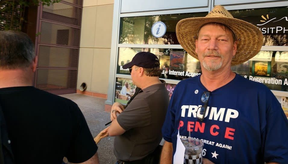 Todd Livingston, 54, lined up Tuesday morning to attend President Donald Trump&rsquo;s rally in Phoenix. Livingston viewed Trump as an &ldquo;average citizen who can become a billionaire and become the president of the United States.&rdquo; (Photo: HuffPost/Roque Planas)