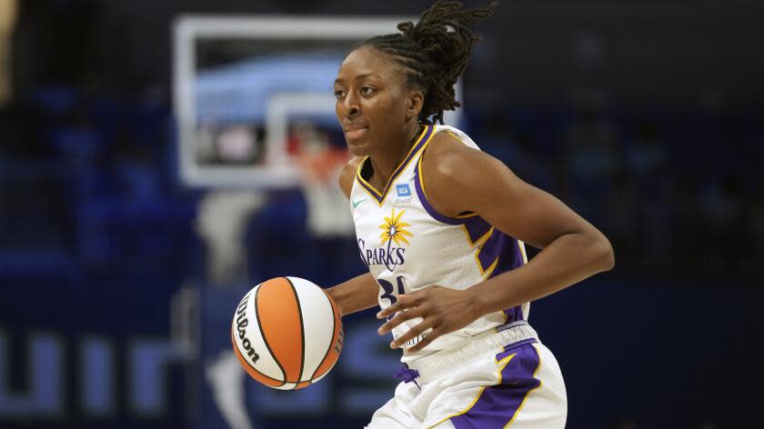 Los Angeles Sparks forward Nneka Ogwumike dribbles during the second half of a WNBA basketball game.