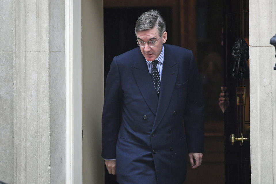 Leader of the House of Commons Jacob Rees-Mogg leaves 10 Downing Street, London, Monday Oct. 21, 2019. British Prime Minister Boris Johnson is expected to push for a vote on his European Union divorce deal as Parliament prepares for a week of guerrilla warfare over Brexit. (Stefan Rousseau/PA via AP)