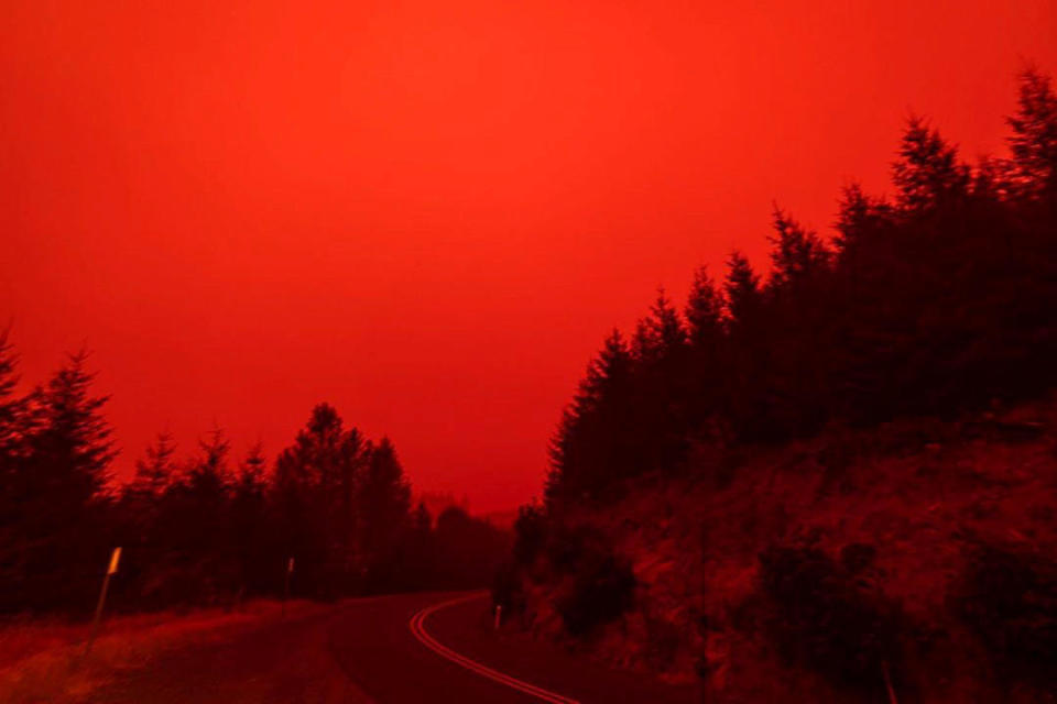 Red sky and thick smoke are seen in Salem City, Oregon. / Credit: ZAK STONE/via REUTERS