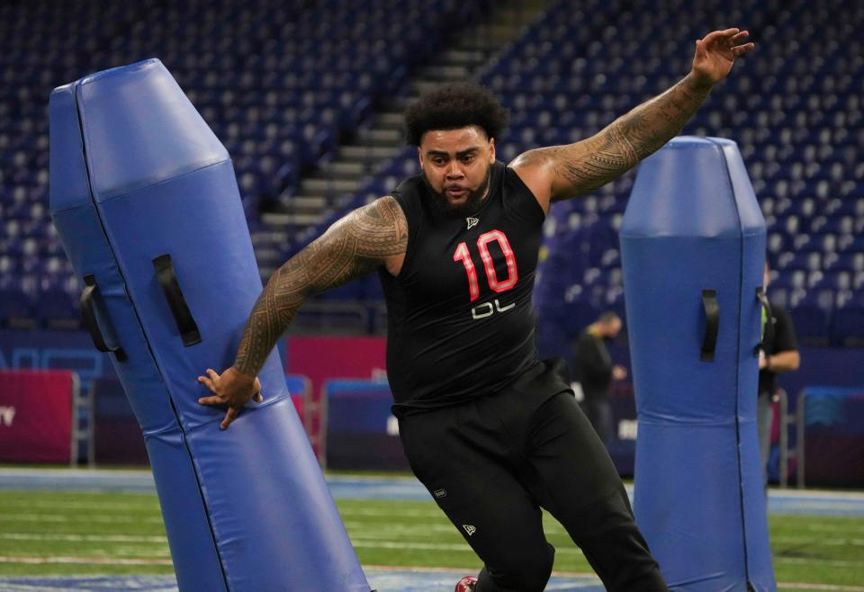 Ohio State defensive lineman Haskell Garrett (DL10) goes through drills during the 2022 NFL Scouting Combine at Lucas Oil Stadium.