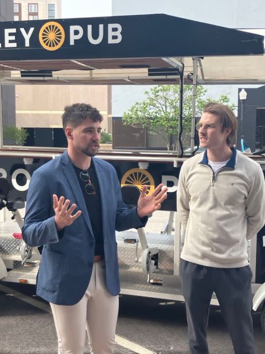 Trolley Pub Quad Cities partners Sam Volkmer, left, and Will Rice, are both St. Ambrose graduates and were managers of the former Pedal Pub Quad Cities (photo by Jonathan Turner).