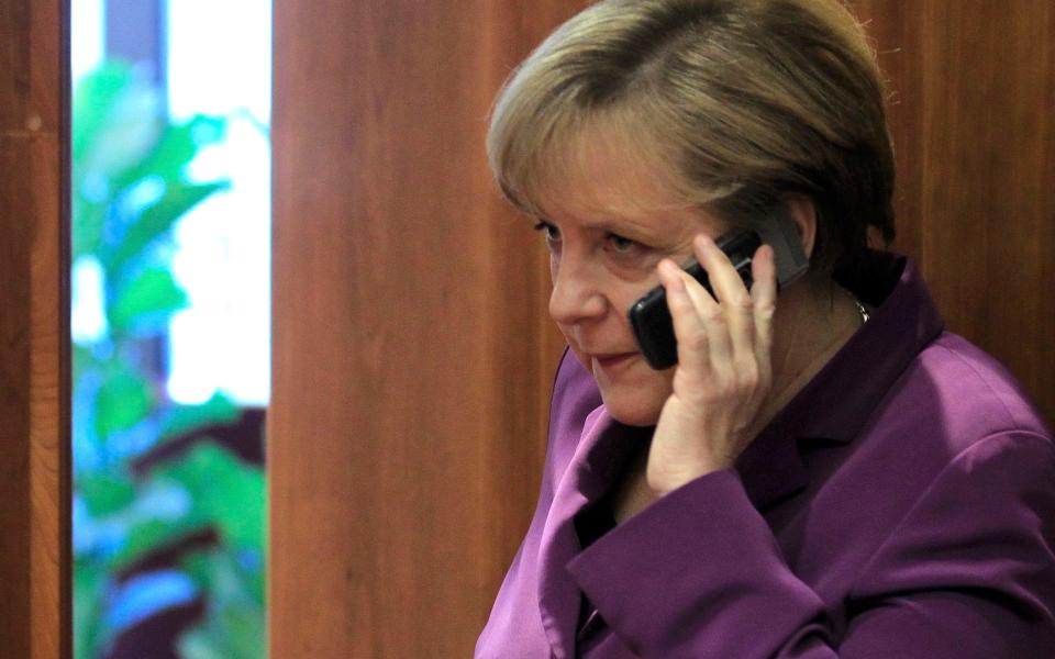 Mrs Merkel  - Credit: REUTERS/Yves Herman