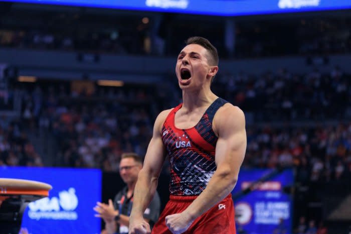 Paul Juda celebrates after competing on the vault during the Trials.<span class="copyright">Nikolas Liepins—Anadolu/Getty Images</span>