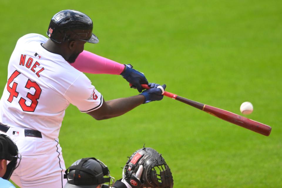 Guardians right fielder Jhonkensy Noel hits a first-inning RBI sacrifice fly against the San Francisco Giants, July 6, 2024, in Cleveland.