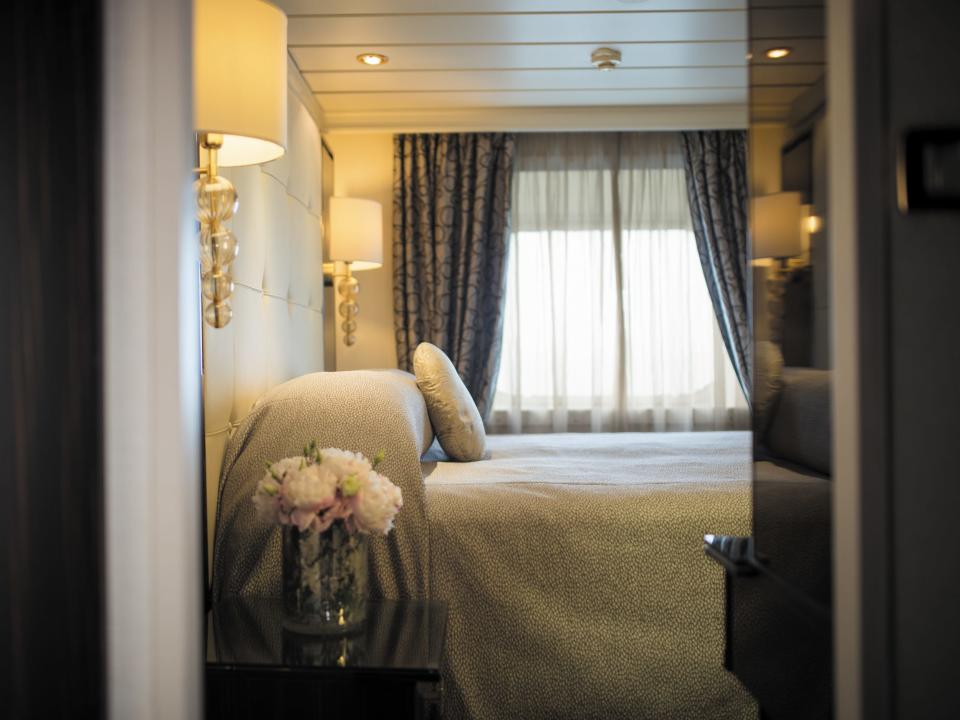 A bedroom on the Seven Seas Mariner.