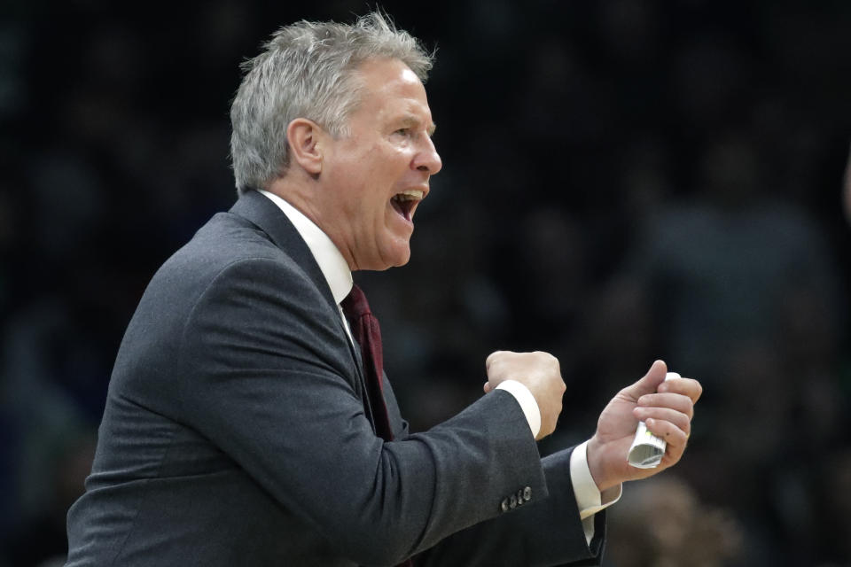 Philadelphia 76ers head coach Brett Brown instructs his players in the second half of an NBA basketball game against the Boston Celtics, Thursday, Dec. 12, 2019, in Boston. (AP Photo/Elise Amendola)