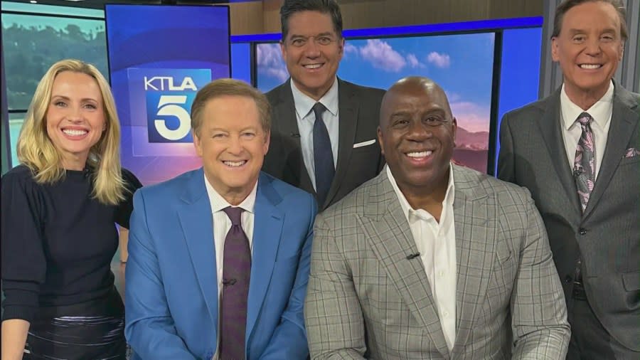 From left: Jessica Holmes, Sam Rubin, Frank Buckley, Magic Johnson and Mark Kriski at KTLA studios. (KTLA)