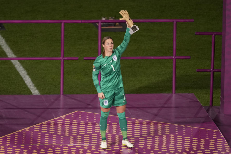 England's goalkeeper Mary Earps reacts after receiving the Golden Glove Award following the Women's World Cup soccer final between Spain and England at Stadium Australia in Sydney, Australia, Sunday, Aug. 20, 2023. (AP Photo/Mark Baker)