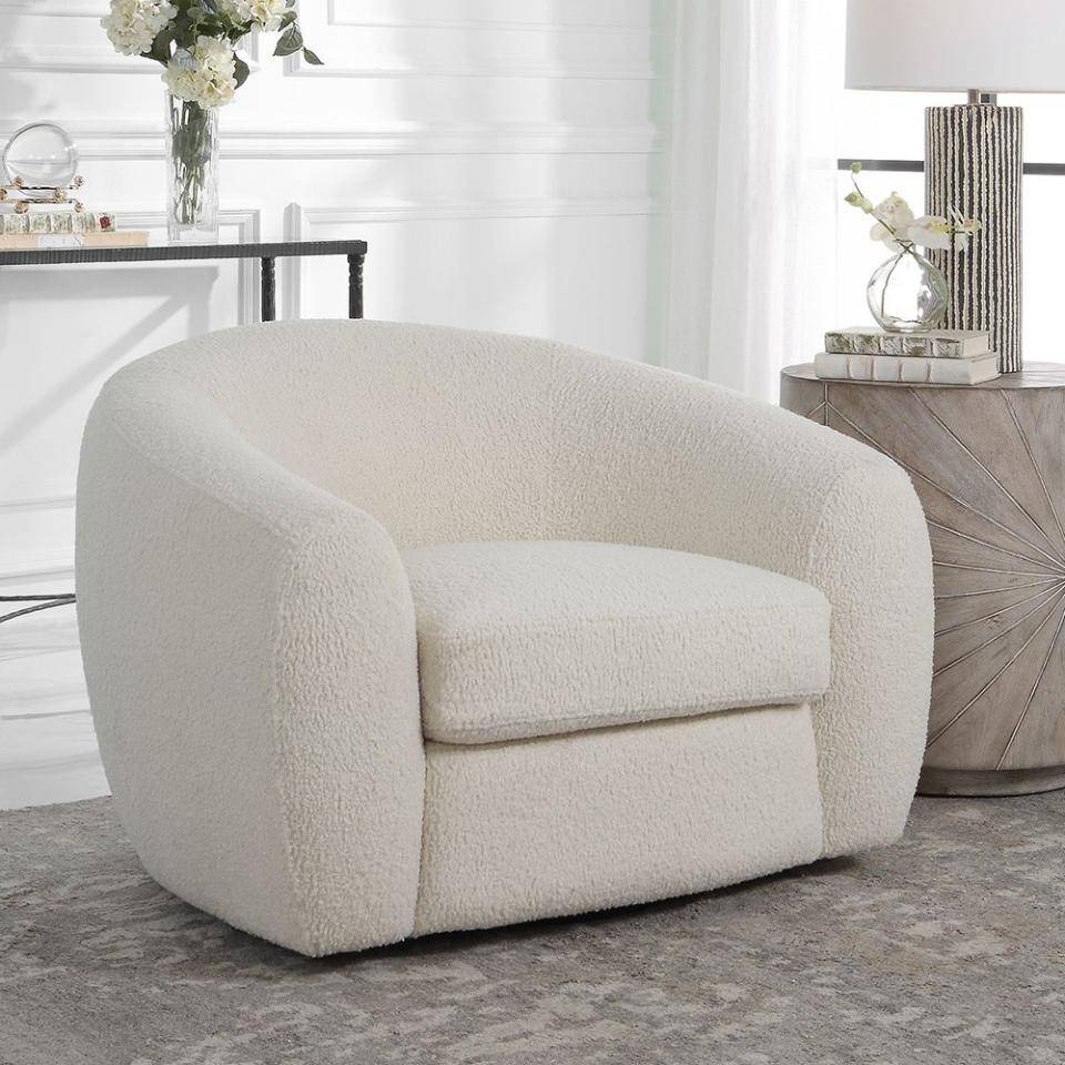 <p><a href="https://go.redirectingat.com?id=74968X1596630&url=https%3A%2F%2Fwww.potterybarn.com%2Fproducts%2Feveline-upholstered-swivel-chair-mp%2F&sref=https%3A%2F%2Fwww.elle.com%2Ffashion%2Fshopping%2Fg60387036%2Fbest-shearling-chairs%2F" rel="nofollow noopener" target="_blank" data-ylk="slk:Shop Now;elm:context_link;itc:0;sec:content-canvas" class="link ">Shop Now</a></p><p>Eveline Upholstered Swivel Armchair</p><p>potterybarn.com</p><p>$1599.00</p>