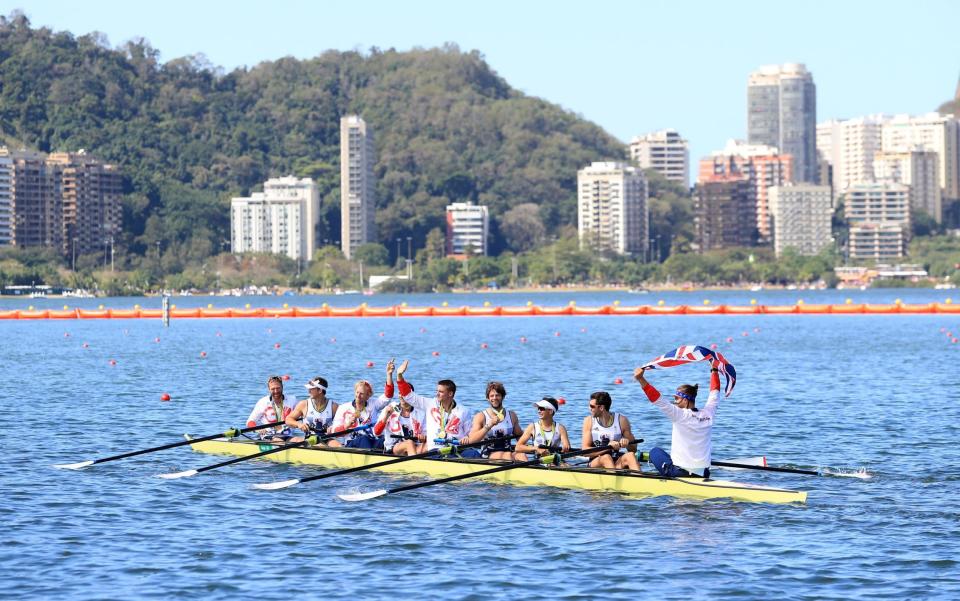Great Britain's Scott Durant, Tom Ransley, Matt Gotrel, Paul Bennett, Matt Langridge, William Satch, cox Phelan Hill, Andrew Triggs Hodge and Pete Reed celebrate out on the water with their Gold Medals for the Men's Eight final on the eighth day of the Rio Olympics Games, Brazil. - Mike Egerton/PA Wire