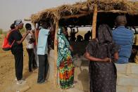 The Wider Image: Senegalese plant circular gardens in Green Wall defence against desert