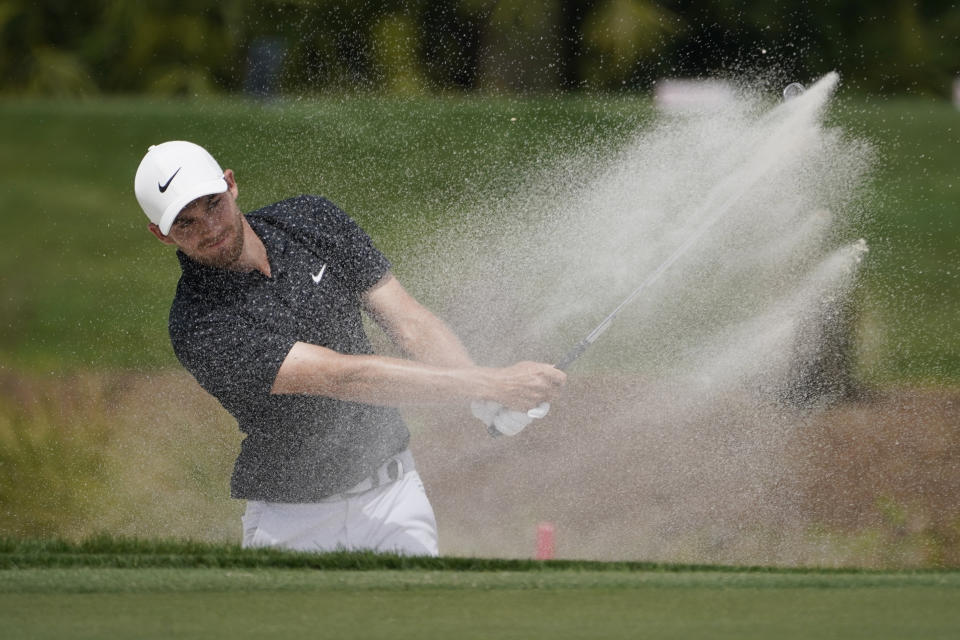 Aaron Wise hits from the sand on the third hole during the third round of the Honda Classic golf tournament, Saturday, March 20, 2021, in Palm Beach Gardens, Fla. (AP Photo/Marta Lavandier)