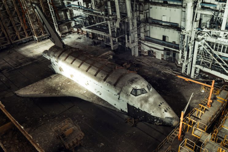 These pictures capture the eerie sight of two abandoned space shuttle explorers in an abandoned building in Kazakhstan.