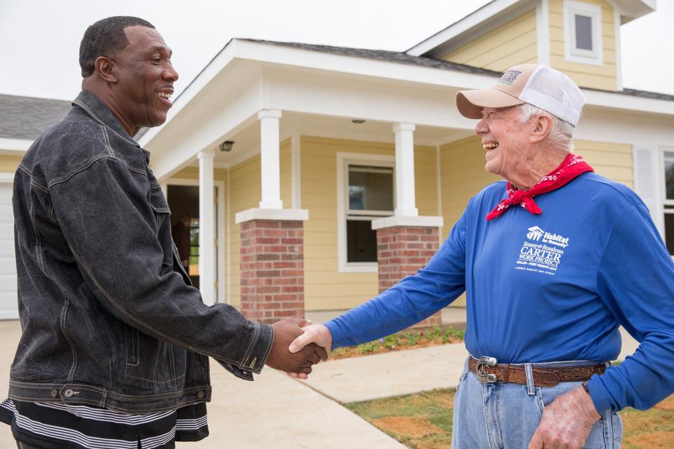 President Carter (right) in Fort Worth, Texas, in 2014.