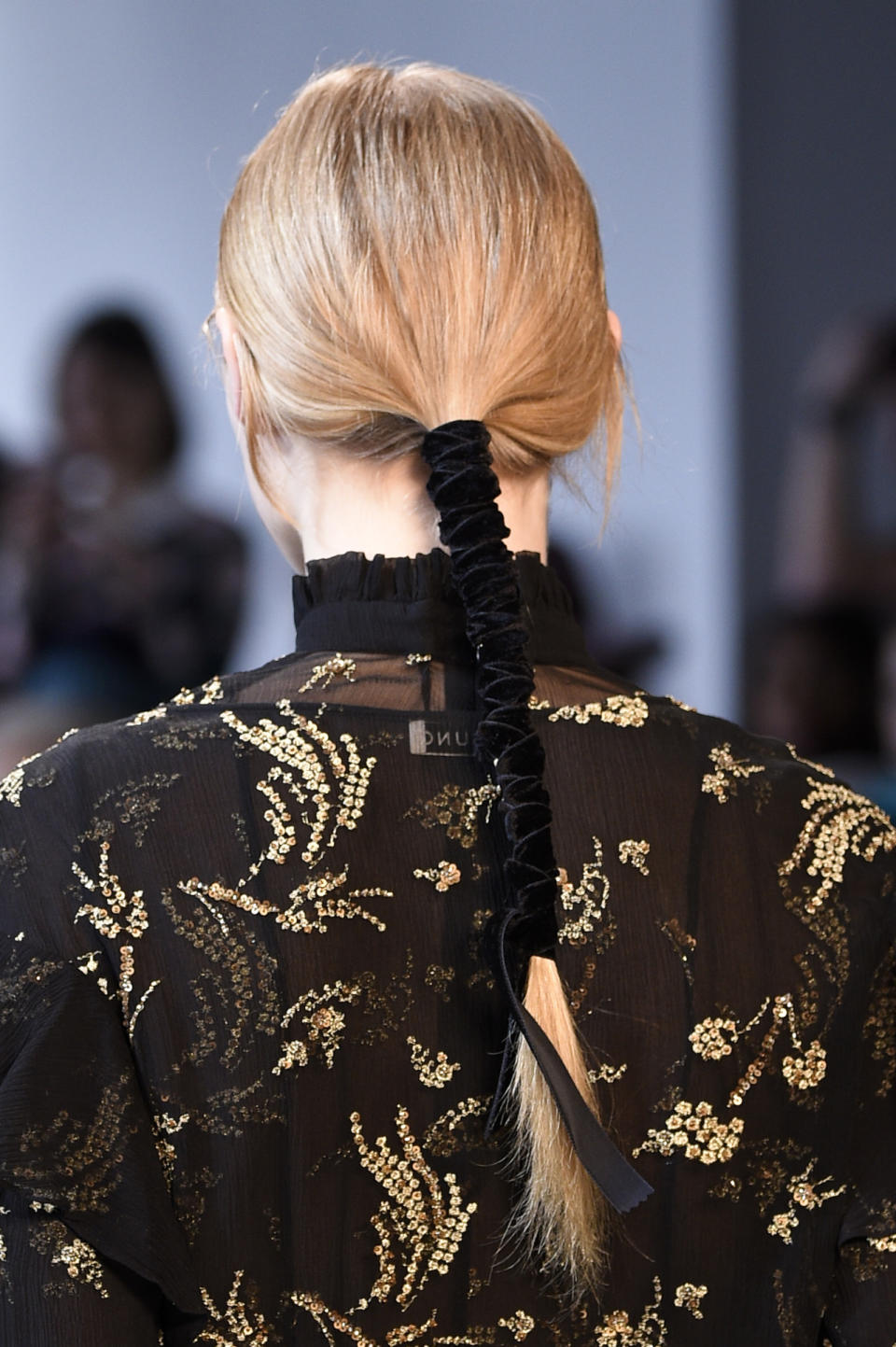 A model's wrapped pony at Suno. (Photo: Getty Images)