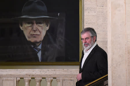 Sinn Fein's Gerry Adams leaves Parliament buildings at Stormont for the last time in his role as Sinn Fein President in Belfast, Northern Ireland, February 9, 2018. REUTERS/Clodagh Kilcoyne