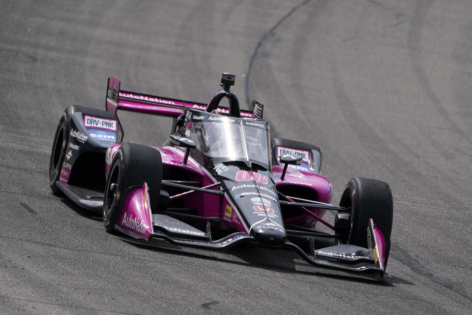 Helio Castroneves, of Brazil, drives during an IndyCar Series auto race, Saturday, July 23, 2022, at Iowa Speedway in Newton, Iowa. (AP Photo/Charlie Neibergall)