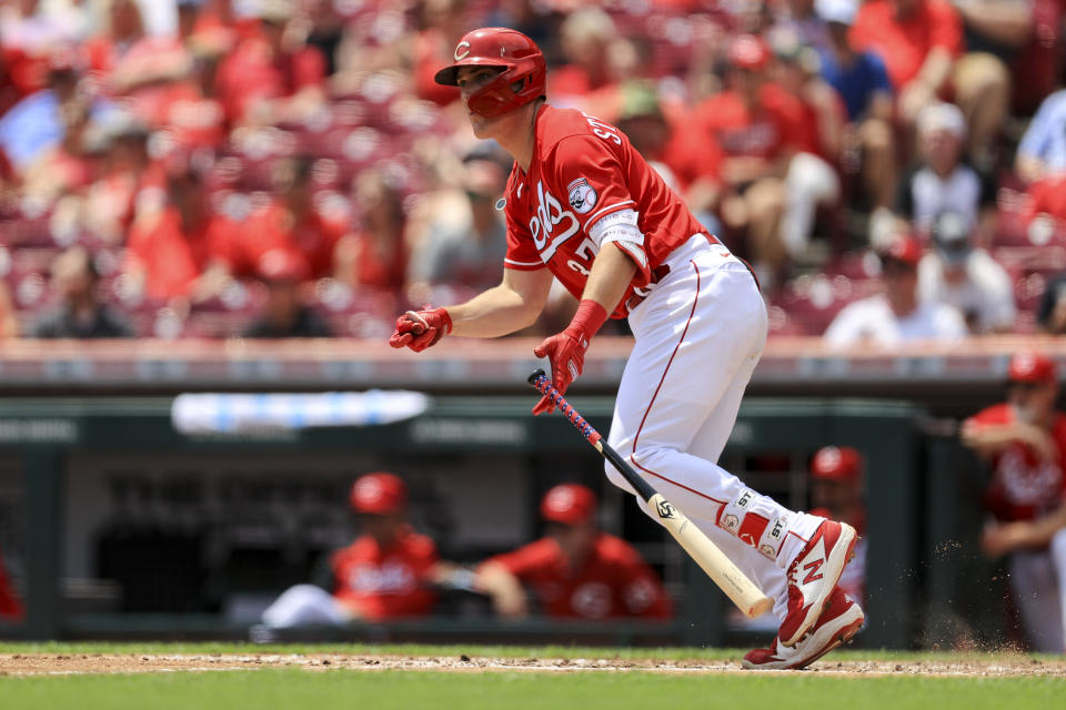 Cincinnati Reds' Tyler Stephenson watches as he hits a three-run double during the second inning of a baseball game against the Milwaukee Brewers in Cincinnati, Wednesday, May 11, 2022. (AP Photo/Aaron Doster)