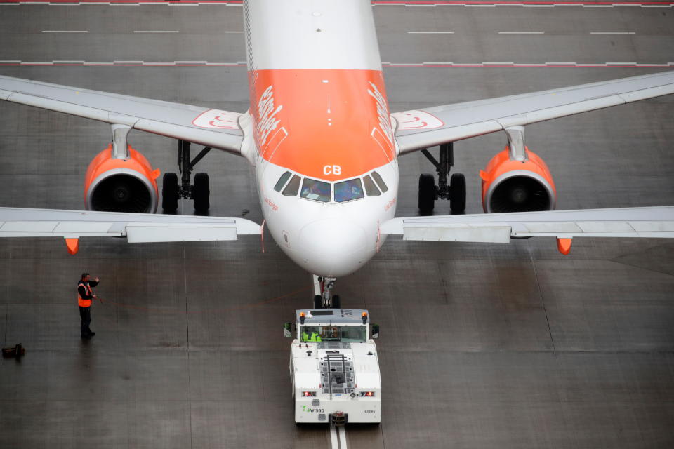 An EasyJet airplane is parked on the tarmac the new Berlin-Brandenburg Airport in Schoenefeld near Berlin, Germany. Photo: Hannibal Hanschke/Reuters