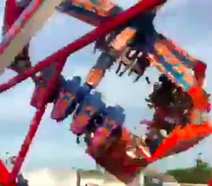 One man was killed and seven people injured when the ride threw people to the ground (AP)