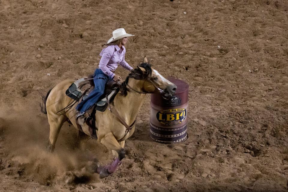 Katelyn Scott competes in barrel racing at the Starr Western Wears Rodeo, which returned to El Paso County Coliseum on Friday, June 16, 2023. The rodeo featured various events, including live music, giveaways and specialty acts.