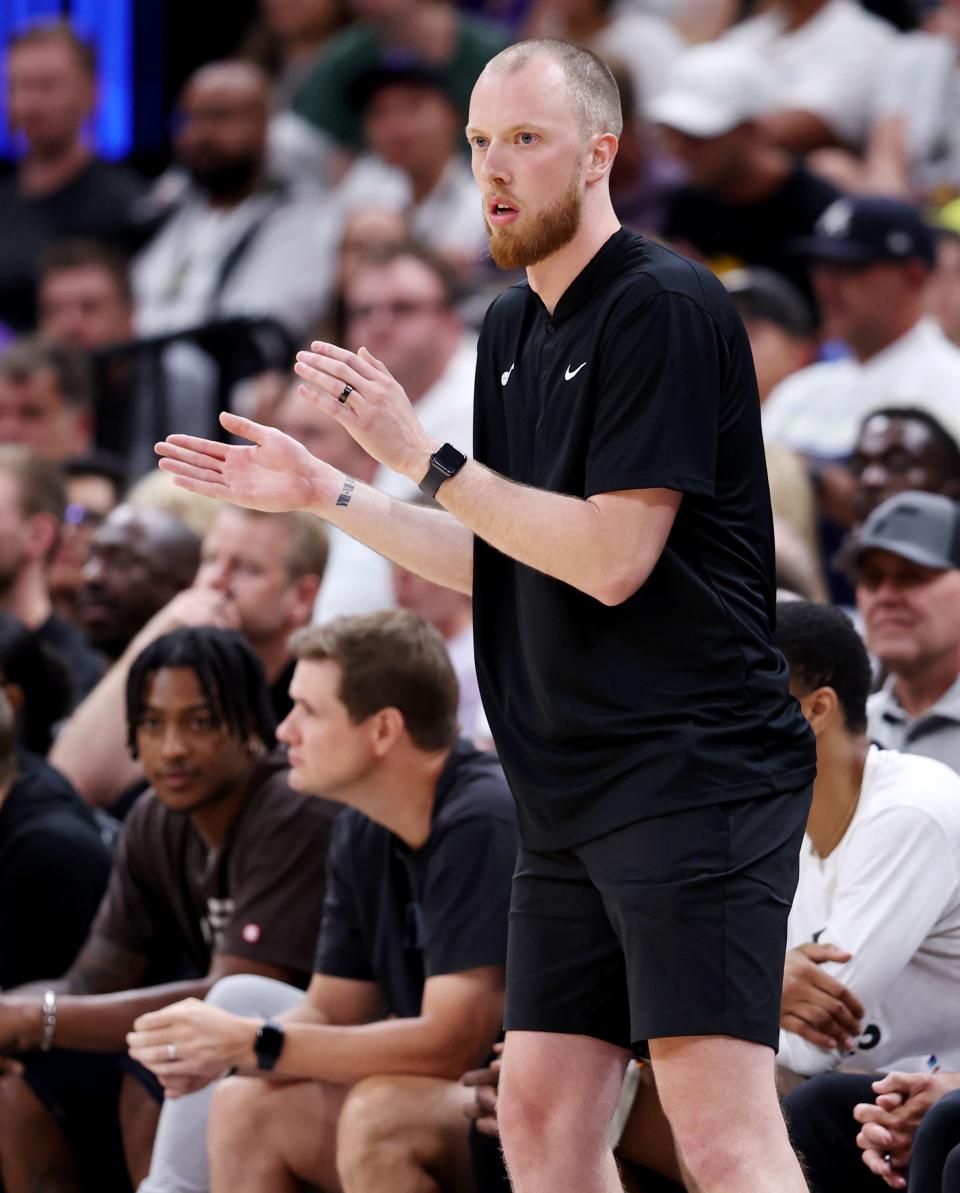 Jazz Assistant coach Evan Bradds applauds during the game as the Utah Jazz and Philadelphia 76ers play in Summer League action at the Delta Center in Salt Lake City on Wednesday, July 5, 2023. 76ers won 104-94. | Scott G Winterton, Deseret News