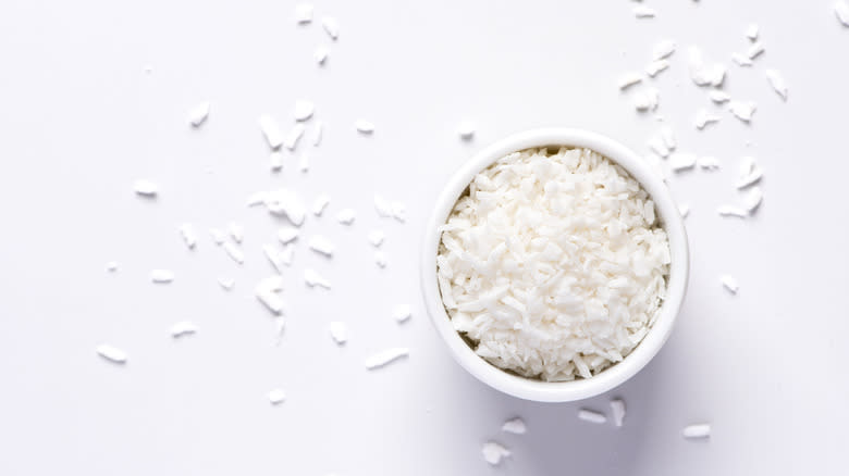 Shredded coconut in white bowl