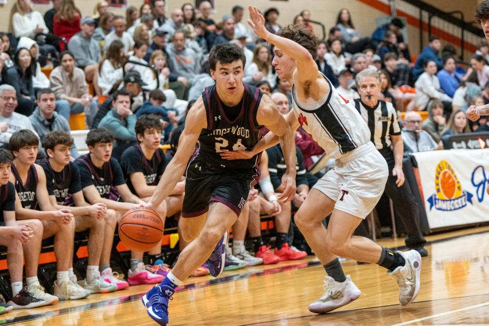 2Jan 27, 2024; Tenafly, New Jersey, United States; Tenafly plays Ridgewood in the Bergen County Jamboree boys basketball tournament at Tenafly High School on Saturday afternoon. From left, R #24 Evan O'Reilly and T #4 Yuval Gutman.