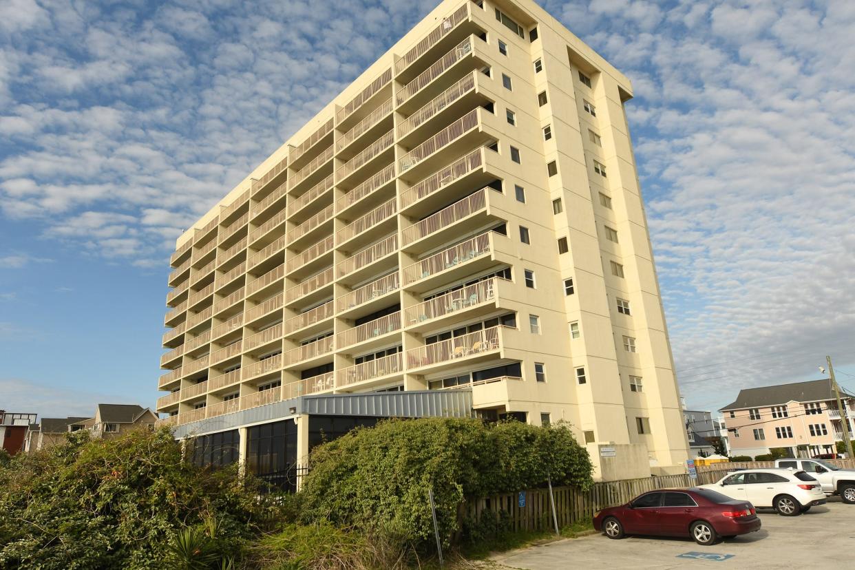 Construction still continues around Pelican Watch Tuesday April 12, 2022 the condos in Carolina Beach closed abruptly last August, cancelling reservations, for stairway repairs.[KEN BLEVINS/STARNEWS]