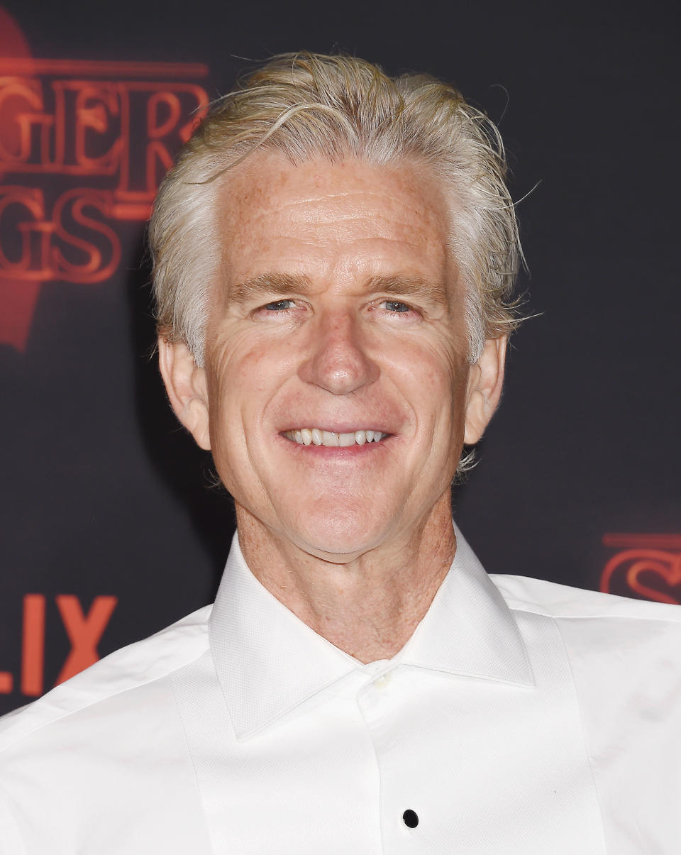 Matthew Modine at an event wearing a classic shirt with a buttoned collar
