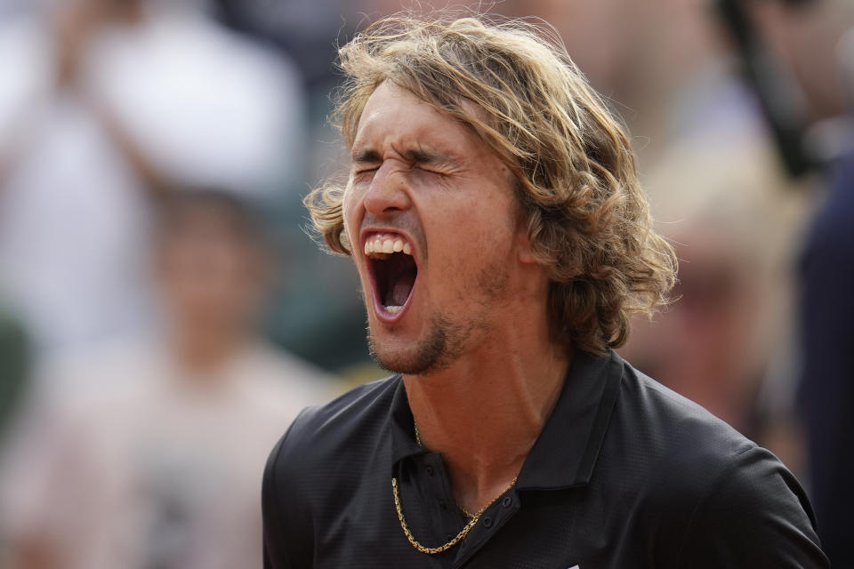 Germany's Alexander Zverev celebrates winning his quarterfinal match of the French Open tennis tournament against Argentina's Tomas Martin Etcheverry in four sets, 6-4, 3-6, 6-3, 6-4, at the Roland Garros stadium in Paris, Wednesday, June 7, 2023. (AP Photo/Christophe Ena)