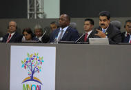 Venezuela's President Nicolas Maduro (R) attends the 17th Non-Aligned Summit in Porlamar, Venezuela September 18, 2016. Miraflores Palace/Handout via REUTERS