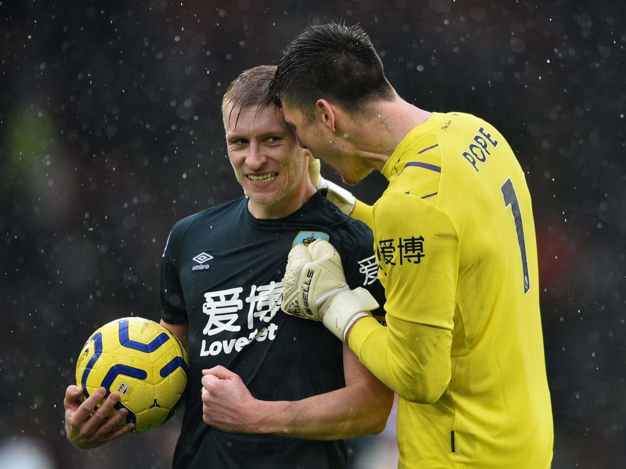 Matej Vydra and Nick Pope celebrate after the final whistle: Getty