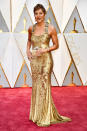 <p>Robin Roberts was working the red carpet as an ABC correspondent, yet her gold Badgley Mischka gown was still one of the best of the night. <em>(Photo: Getty Images)</em> </p>