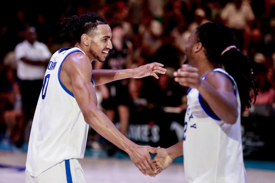 Kentucky basketball’s Jacob Toppin and Cason Wallace celebrate during the Wildcasts’ 118-56 win over Carleton University in the Bahamas on Saturday, August 13, 2022.