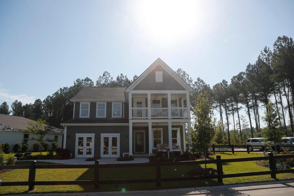 A two-story model home on Outfitters Park Drive inside Heartwood Richmond Hill.