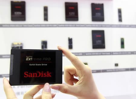 Sandisk's new solid state drive is displayed at the Sandisk booth during the 2014 Computex exhibition at the TWTC Nangang exhibition hall in Taipei June 3, 2014. REUTERS/Pichi Chuang