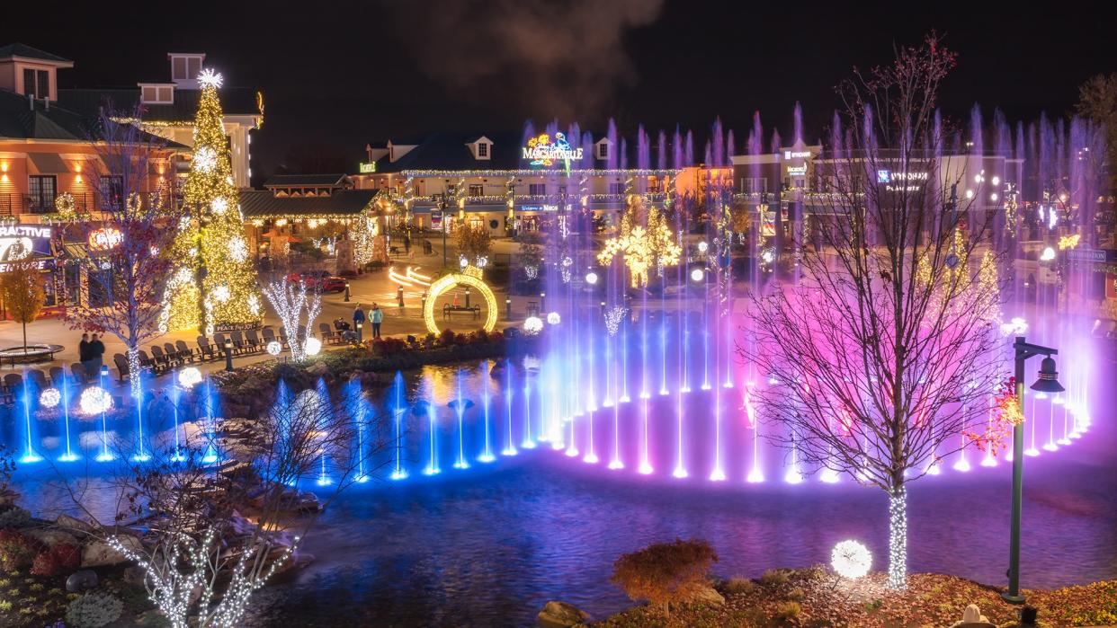 Pigeon Forge, Tennessee - December 3, 2017 : A colorful display from state of the art, multi-tiered show fountain at The Island.