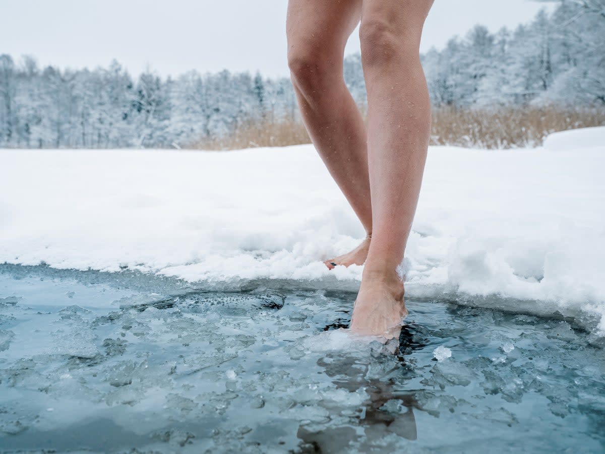 Wild swimming not advisable in bitter cold but can be highly beneficial in warmer weather if practioners take due care (Getty/iStock)