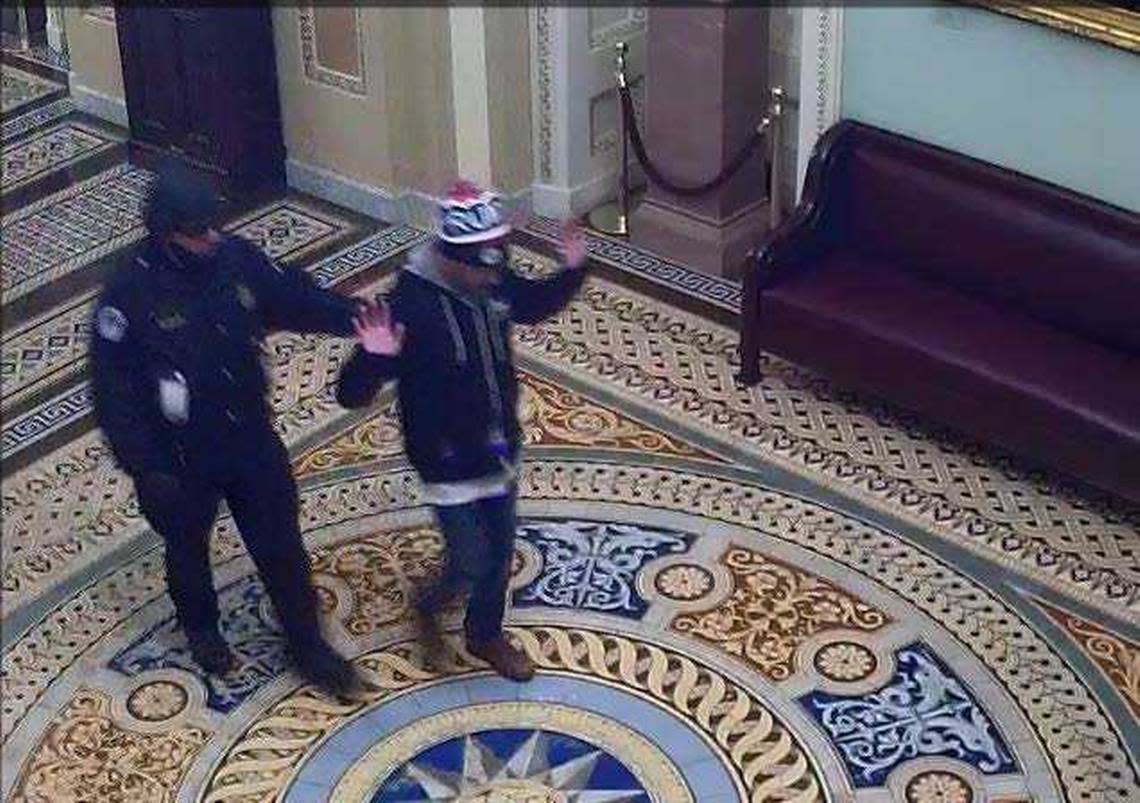 In an image take from video, Tommy Allen is seen being escorted out of the U.S. Capitol building following a riot on Jan. 6, 2021, in Washington, D.C. The Rocklin man was sentenced Thursday to 21 months in prison.