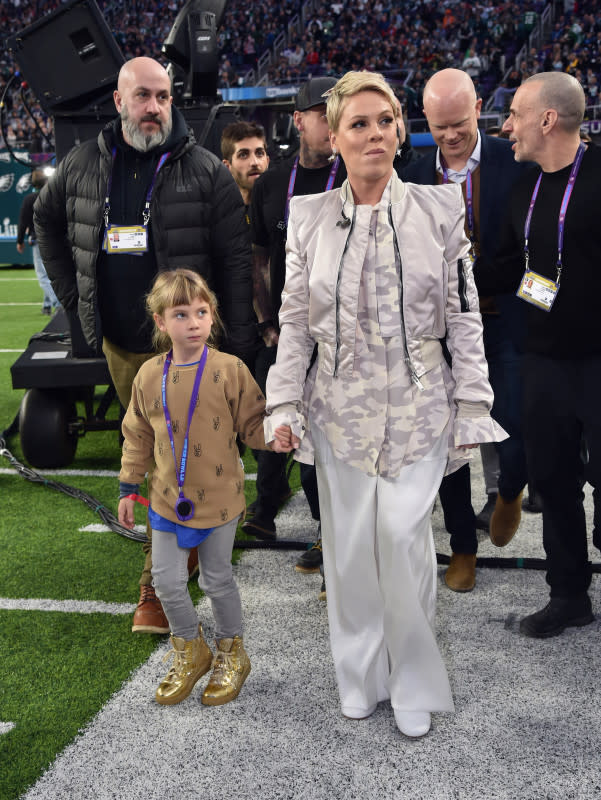 Pink holds hands with daughter Willow Sage Hart at the Super Bowl LII pregame show on Feb. 4, 2018. Can see you the cough drop in her mouth as she heads to the mic to perform the national anthem?<p>Kevin Mazur/WireImage</p>