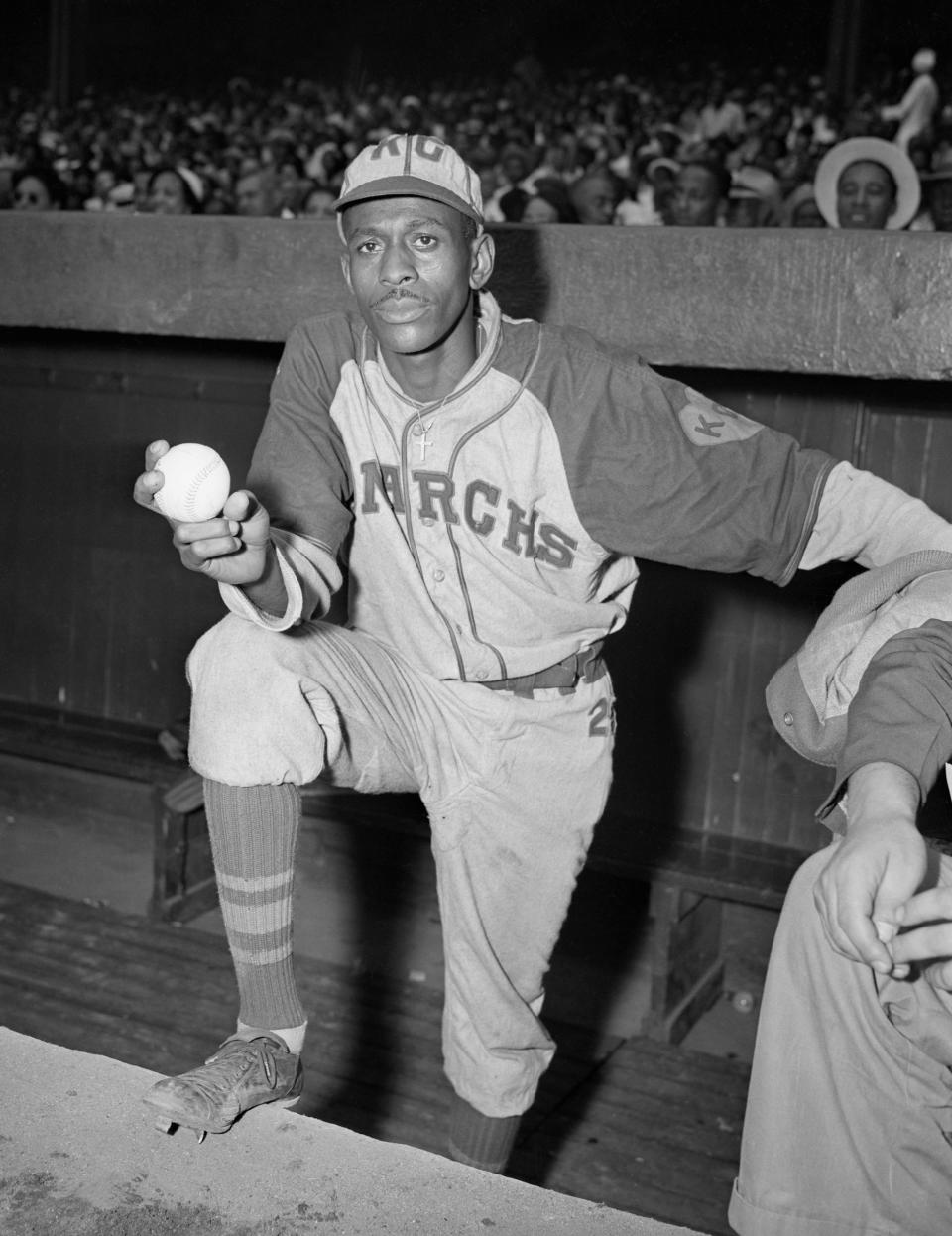 Satchel Paige in the Kansas City Monarchs' dugout