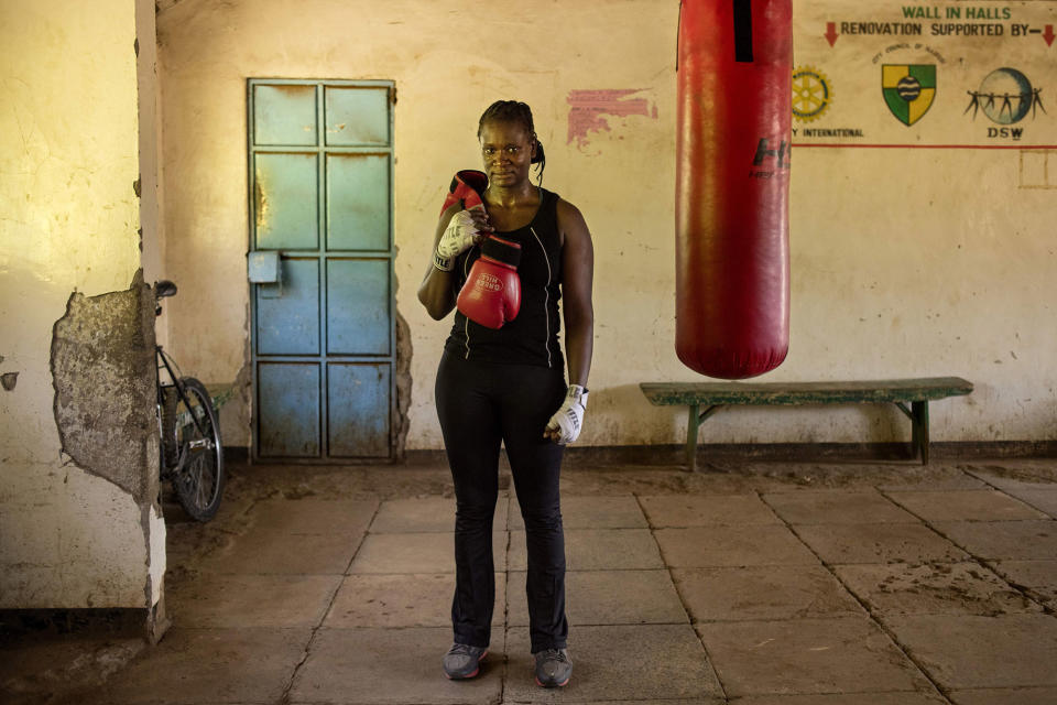 <p>Sarah Achieng a 31-year-old professional boxer and sports administrator, poses after her training session at Kariobangi social hall gym in Nairobi on February 27, 2018. (Photo: Patricia Esteve/AFP/Getty Images) </p>