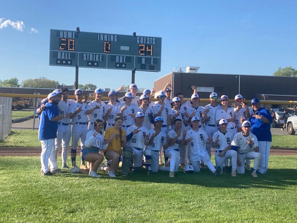 The Spotswood baseball team poses after beating St. Thomas Aquinas on May 2, 2024. The Chargers repeated as GMC Blue Division champions.