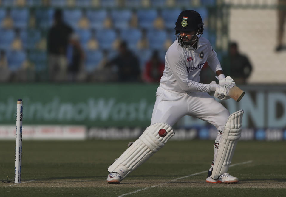 India's Shreyas Iyer plays a shot during the day one of their first test cricket match with New Zealand in Kanpur, India, Thursday, Nov. 25, 2021. (AP Photo/Altaf Qadri)