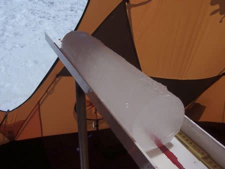 A section of ice core that researchers at the Ohio State University extracted from the Quelccaya Ice Cap in Peru is seen in a handout picture taken in 2003. REUTERS/Paolo Gabrielli, courtesy of Ohio State University/Handout via Reuters