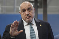 Bulgarian Prime Minister Boyko Borissov arrives for an EU summit at the European Council building in Brussels, Friday, Feb. 21, 2020. In a second day of meetings EU leaders will continue to discuss the bloc's budget to work out Europe's spending plans for the next seven years. (Ludovic Marin, Pool Photo via AP)